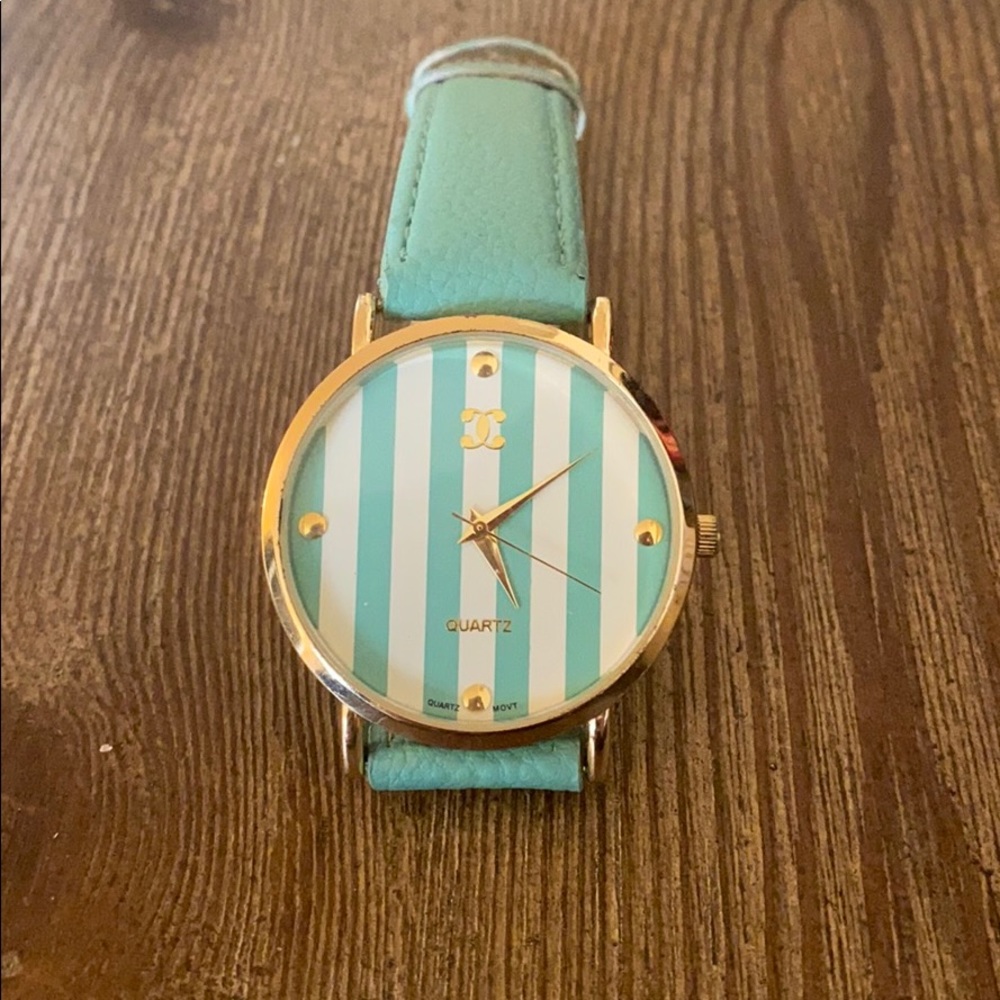 Turquoise watch. Needs battery.